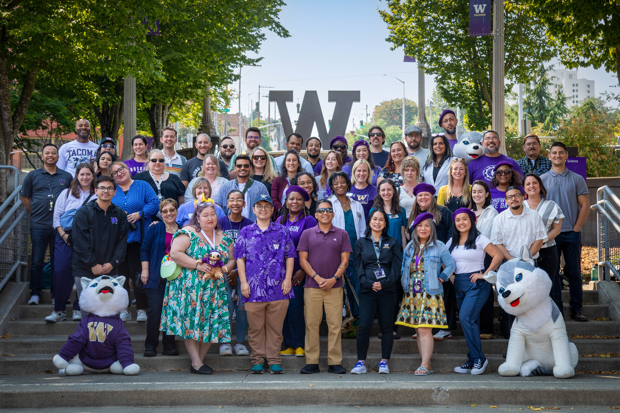 Group photo of student affairs staff on steps outside