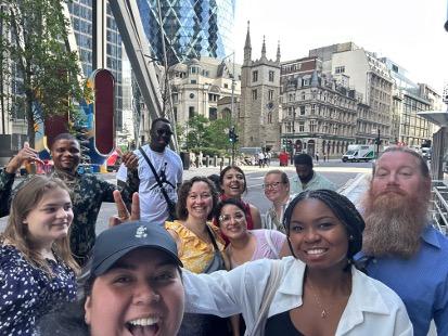 group of people posing for a selfie