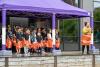 Small children performing on a stage at husky fest